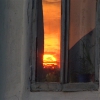 Закат в окно дома на улице Ленина. Автор: IPAAT